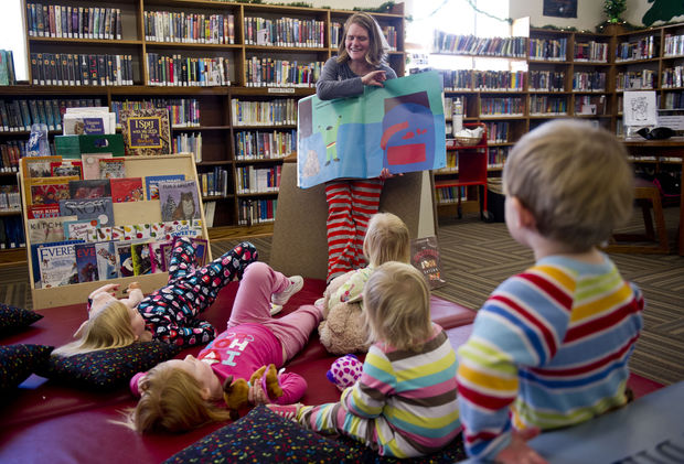 Library pajama party: story time holds “answers and worlds” for kids to explore